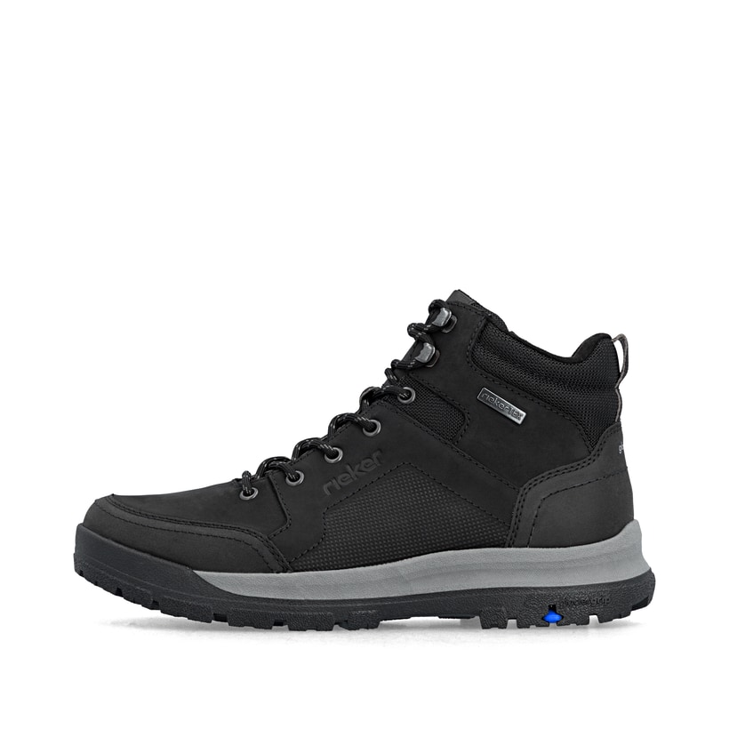 Schwarze Rieker Herren Schnürstiefel 30301-00 mit dem umdrehbaren Glacier Grip. Schuh Außenseite.