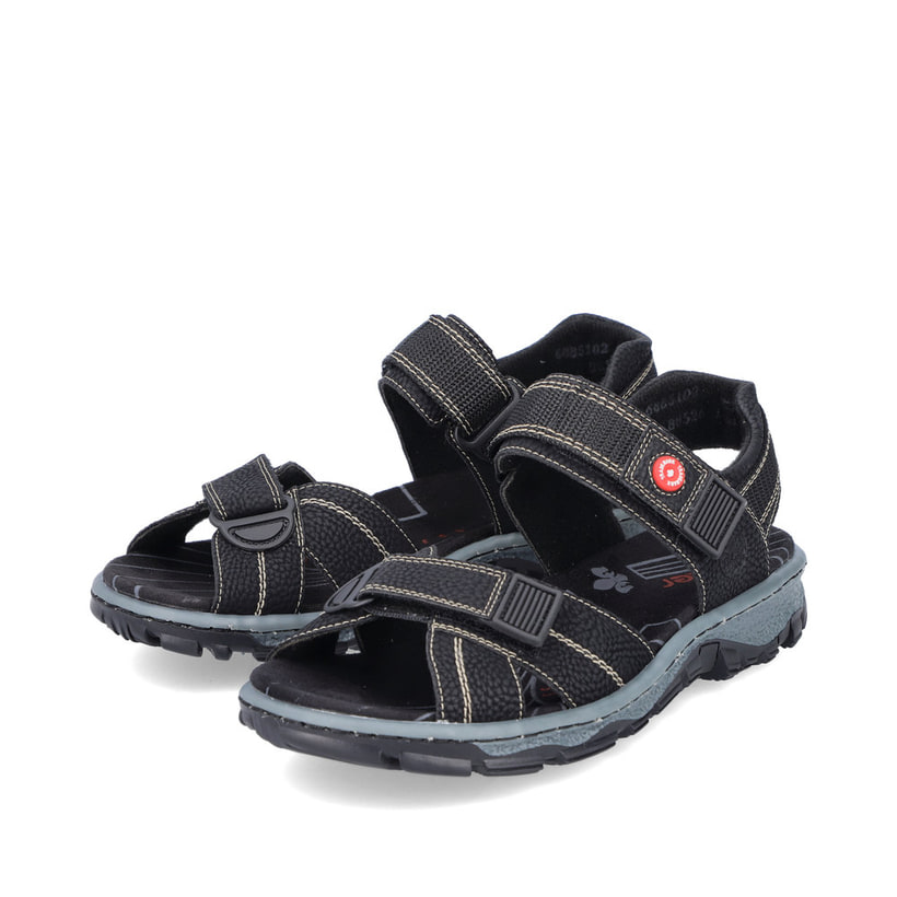 Schwarze Rieker Damen Trekkingsandalen 68851-02 mit einem Klettverschluss. Schuhpaar seitlich schräg.
