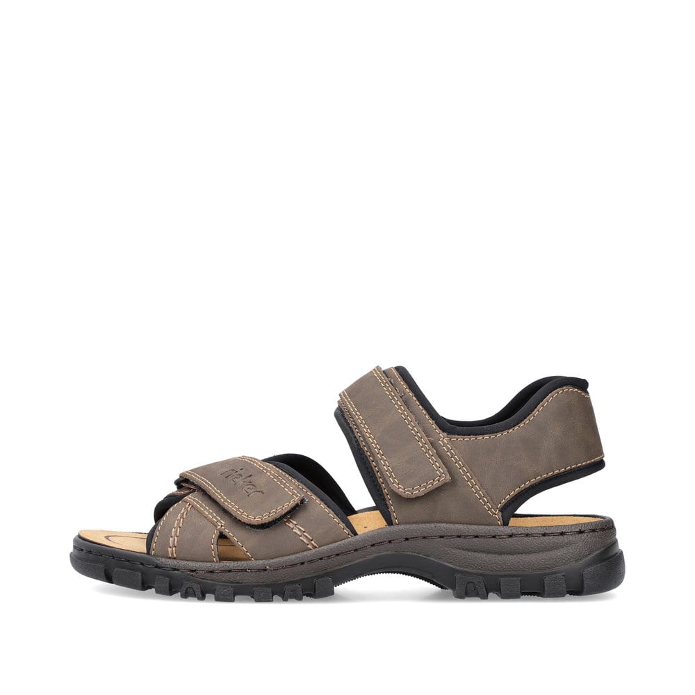 Braune Rieker Herren Trekkingsandalen 25051-27 mit einem Klettverschluss. Schuh Außenseite.