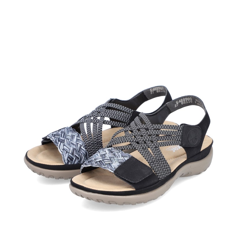 Schwarze Rieker Damen Trekkingsandalen 64889-00 mit einem Klettverschluss. Schuhpaar seitlich schräg.