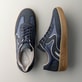 Weiße Rieker Damen Sneaker Low M5509-80 mit strapazierfähiger Sohle. Schuh Außenseite gespiegelt.