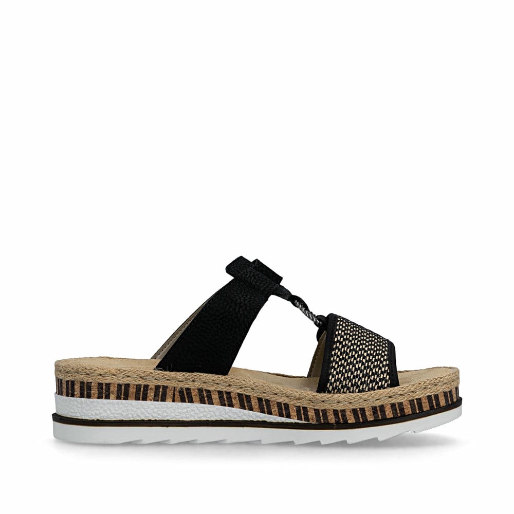 Schwarze Rieker Damen Pantoletten V7947-00 mit einem Klettverschluss. Schuh Innenseite.