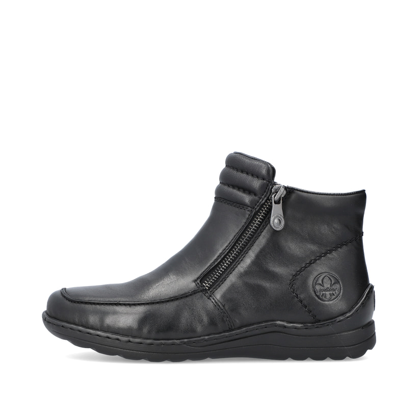
Glanzschwarze Rieker Damen Kurzstiefel 48999-00 mit einer schockabsorbierenden Sohle. Schuh Außenseite