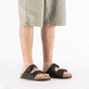 Mules Rieker noires pour homme 21190-00 avec boucles. Chaussure au pied.