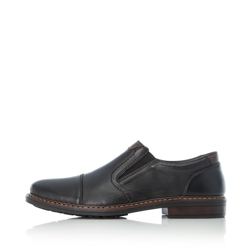 Schwarze Rieker Herren Slipper 17659-00 mit einem Gummizug sowie Extraweite H. Schuh Außenseite.