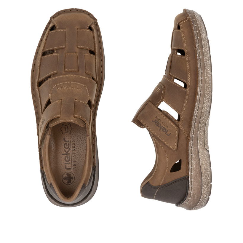 Braune Rieker Herren Slipper 03078-25 mit Klettverschluss sowie der Extraweite H. Schuh von oben, liegend.