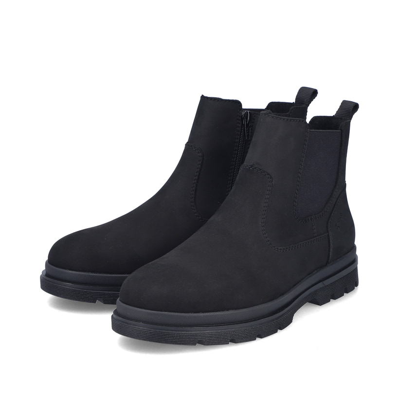 Schwarze Rieker Herren Chelsea Boots F7051-00 aus Rauleder mit Reißverschluss. Schuhpaar seitlich schräg.