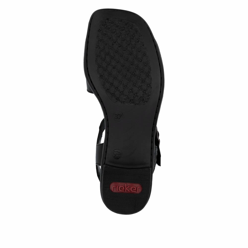 Sandales Rieker noires femme 62685-00 en cuir lisse avec boucle tendance. Semelle extérieure de la chaussure.
