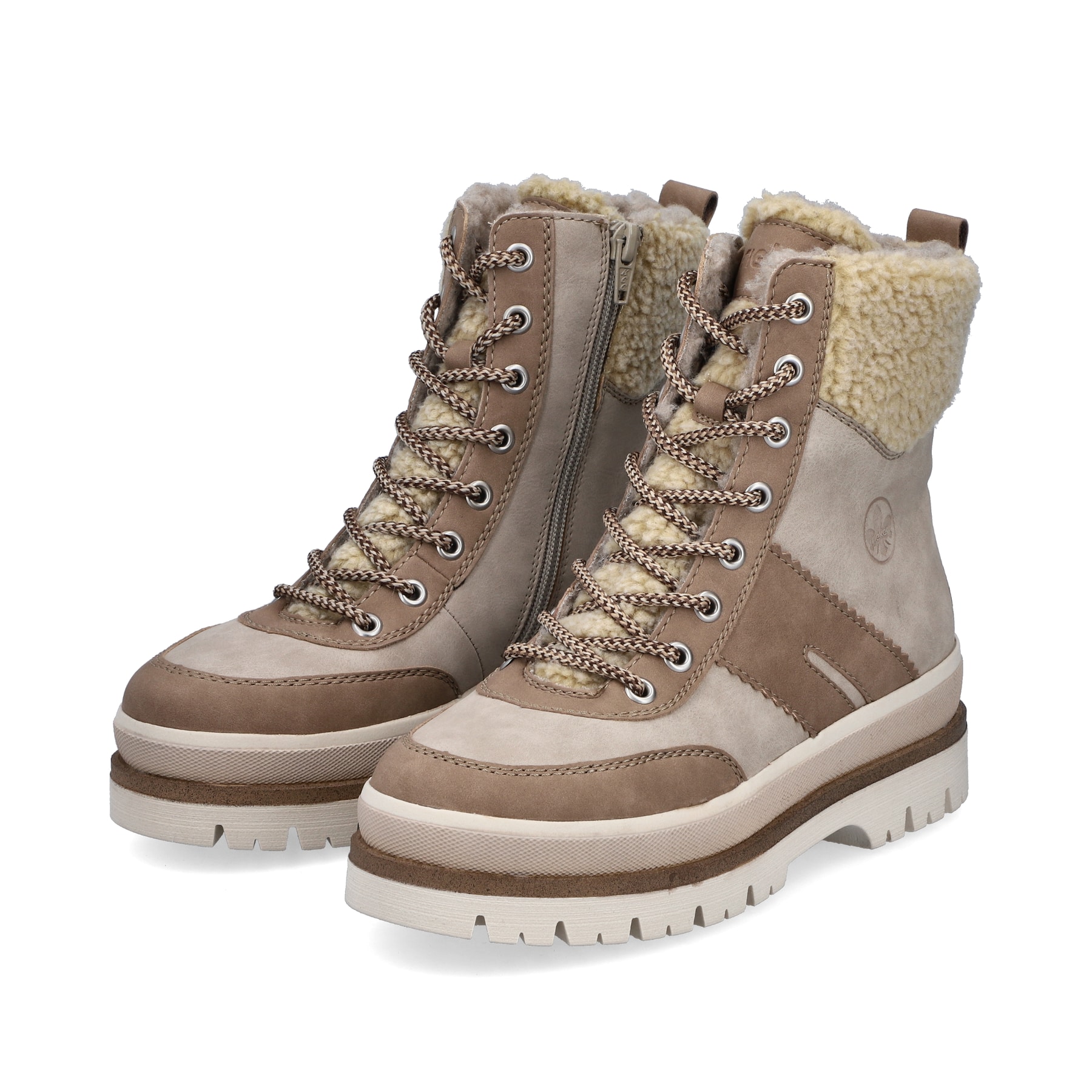 Beige Rieker Damen Schnürstiefel Y6230-62 mit Schaftkragen sowie Reißverschluss. Schuhpaar seitlich schräg.