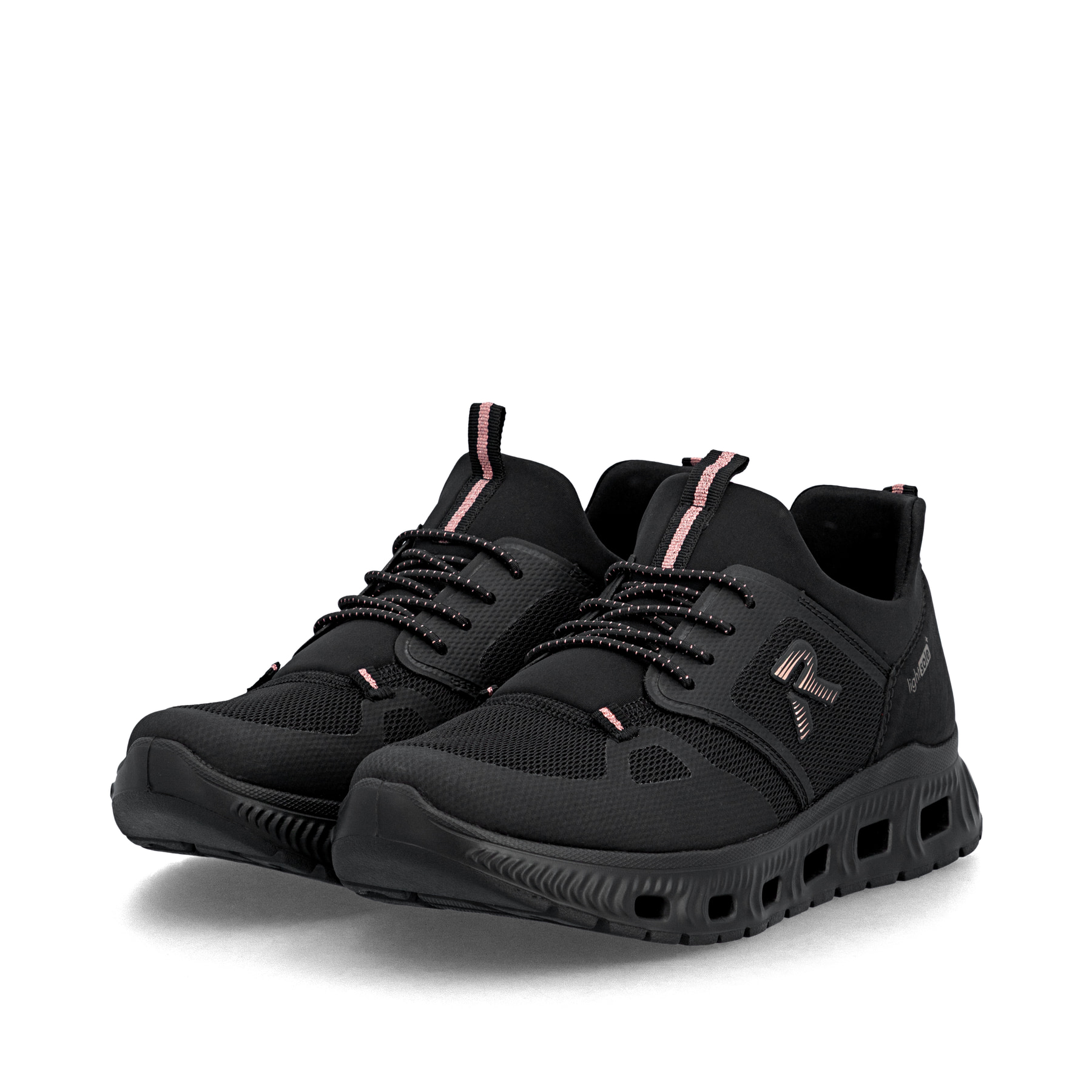 Mocassins Rieker noirs végan pour femmes M6078-00 avec bande élastique. Chaussures inclinées sur le côté.