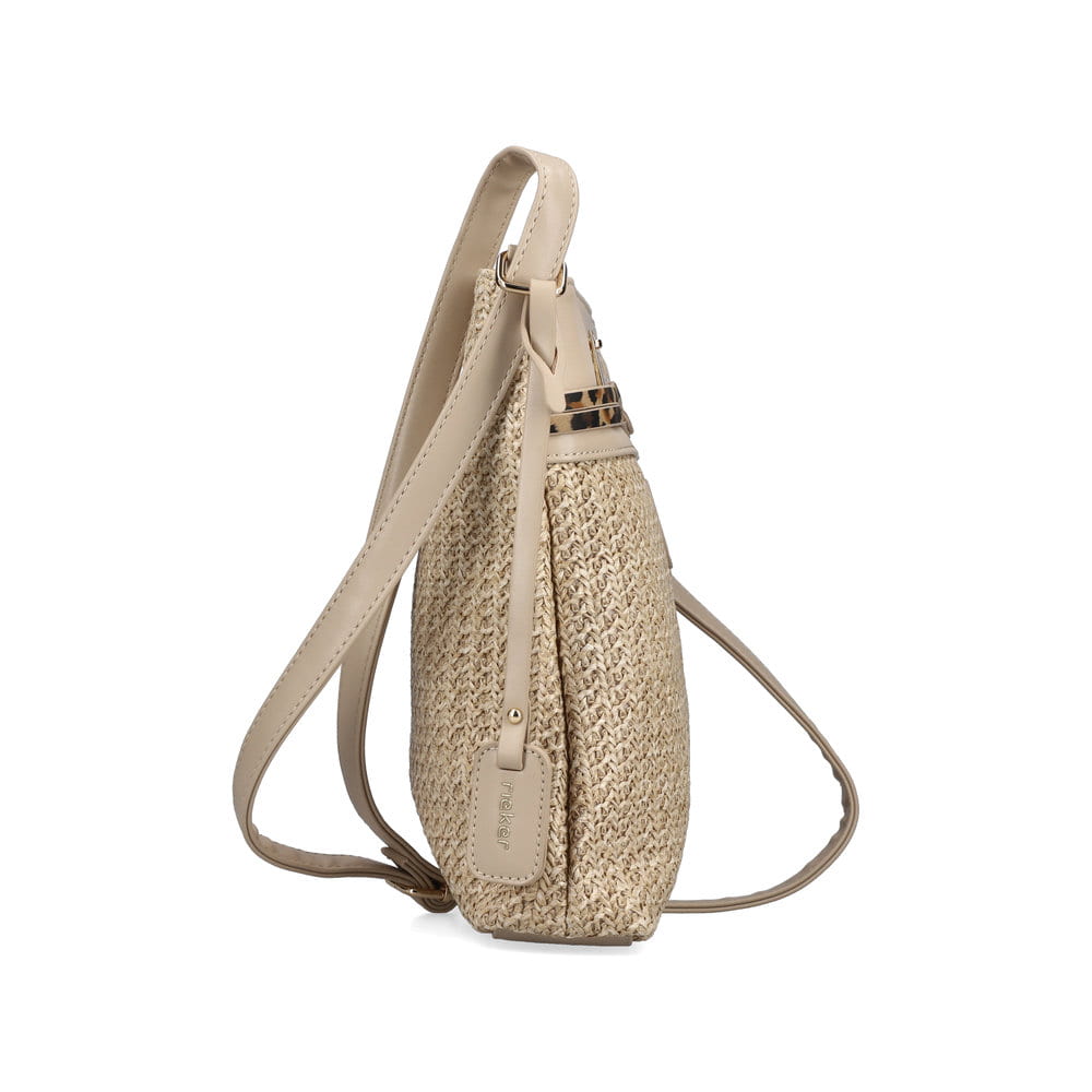 Sac à main Rieker H1519-65 beige avec aspect raphia, fermeture éclair et bandoulière réglable. Côté droit.