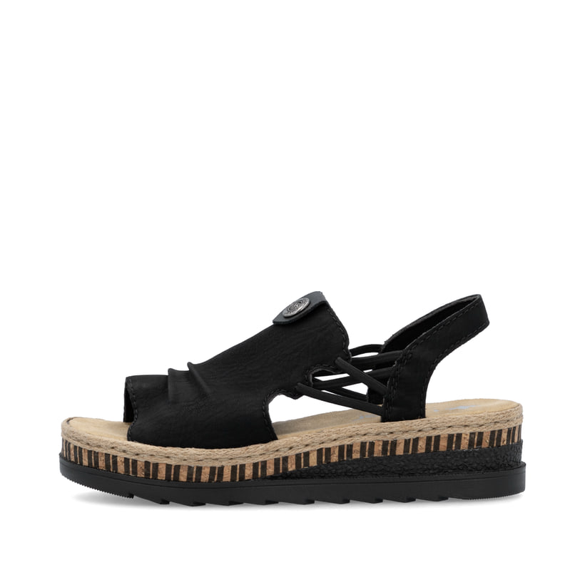 Schwarze Rieker Keilsandaletten V7972-00 mit modischen Raffungen sowie Gummizug. Schuh Außenseite.