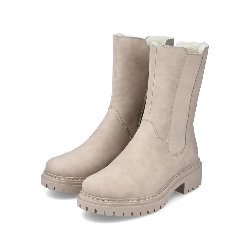 Hellbeige Rieker Damen Chelsea Boots 72683-62 mit einer schockabsorbierenden Sohle. Schuhpaar schräg.