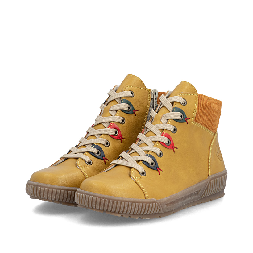 Ockerfarbene Rieker Damen Schnürstiefel N0711-68 mit farbenfrohen Details. Schuhpaar seitlich schräg.