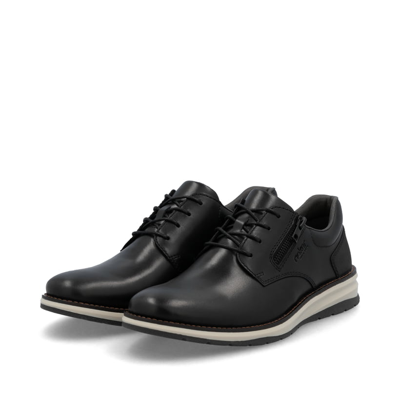Schwarze Rieker Herren Schnürschuhe 14706-00 aus Glattleder mit Reißverschluss. Schuhpaar seitlich schräg.