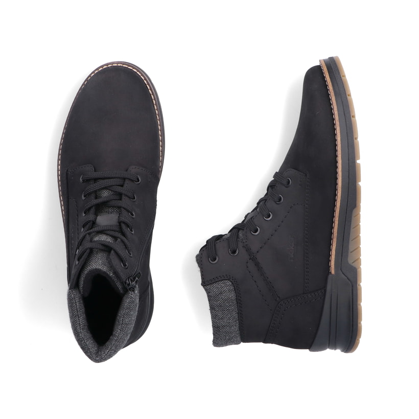 Carbonschwarze Rieker Herren Schnürstiefel 32334-00 mit einem Reißverschluss. Schuh von oben, liegend.