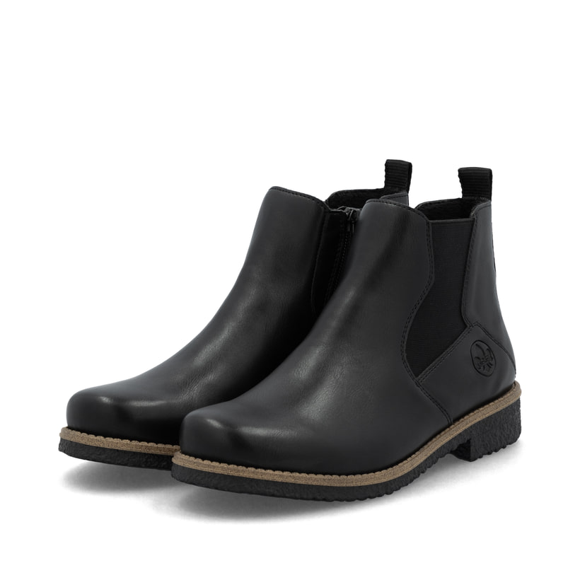 Schwarze Rieker Damen Chelsea Boots 73557-01 mit einem Reißverschluss. Schuhpaar seitlich schräg.