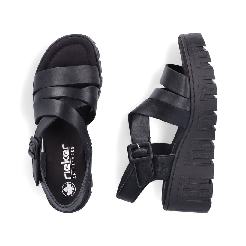 Schwarze Rieker Keilsandaletten 68063-00 mit trendiger Schnalle. Schuh von oben, liegend.