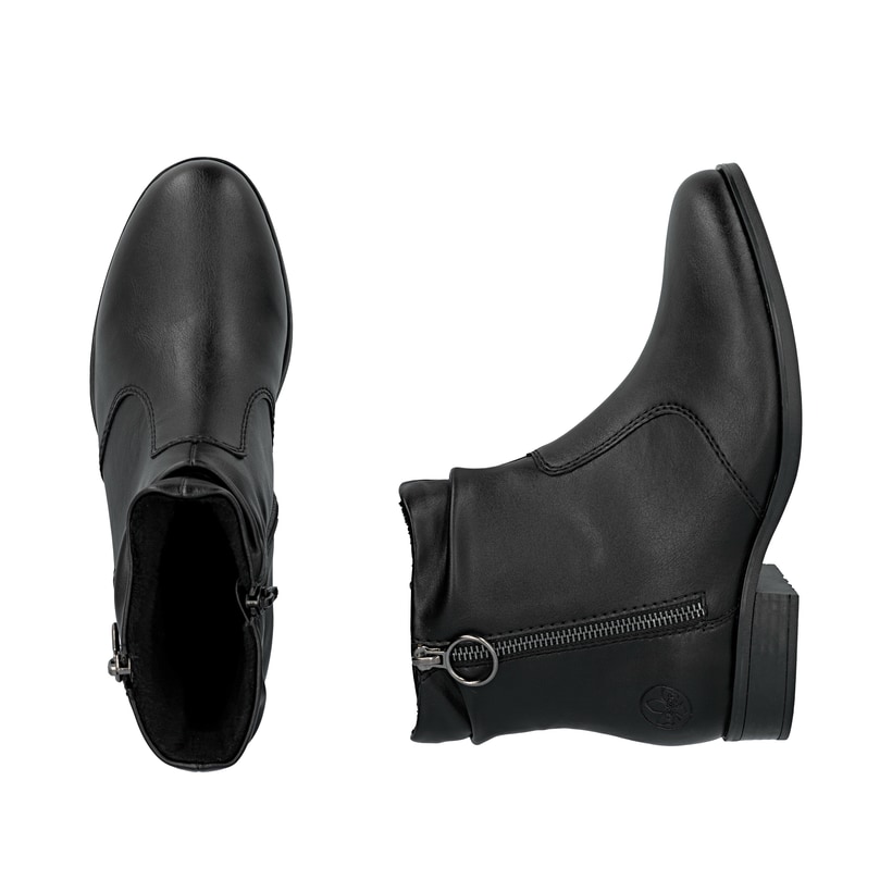 Schwarze Rieker Damen Stiefeletten 77041-00 mit einem Reißverschluss. Schuh von oben, liegend.