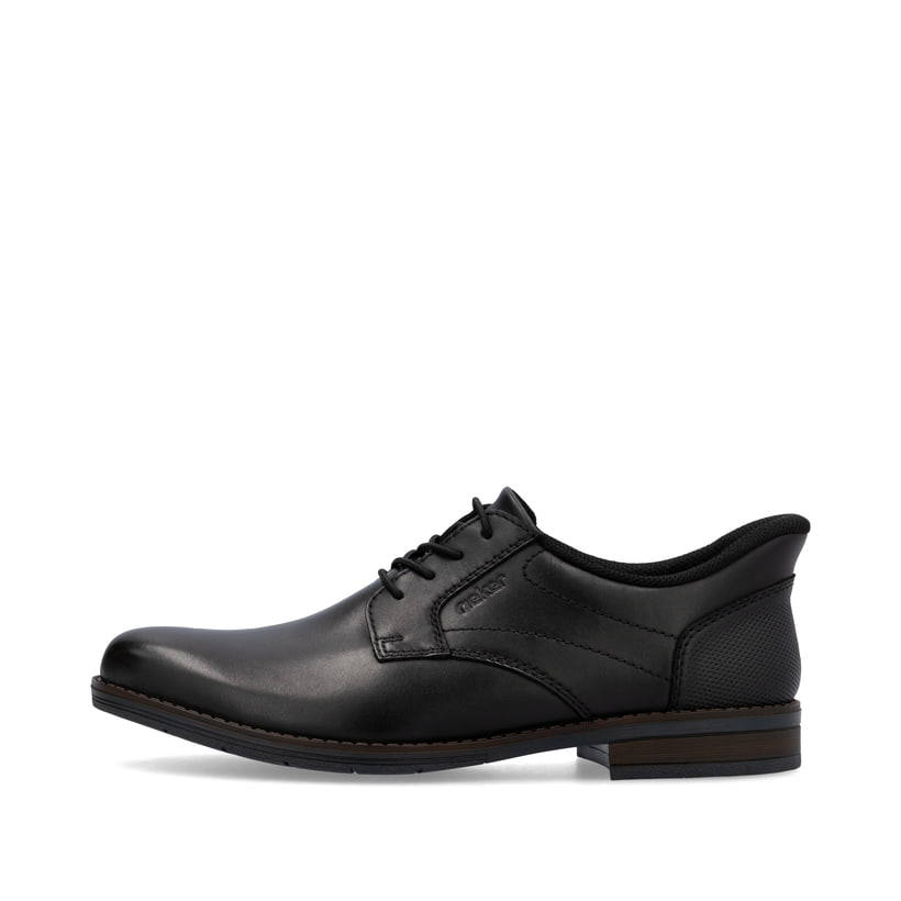 Schwarze Rieker Herren Slipper 10353-00 mit easy Hineinschlüpf-Möglichkeit. Schuh Außenseite.
