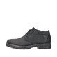 
Asphaltschwarze Rieker Herren Schnürschuhe 33142-00 mit einer robusten Profilsohle. Schuh Außenseite