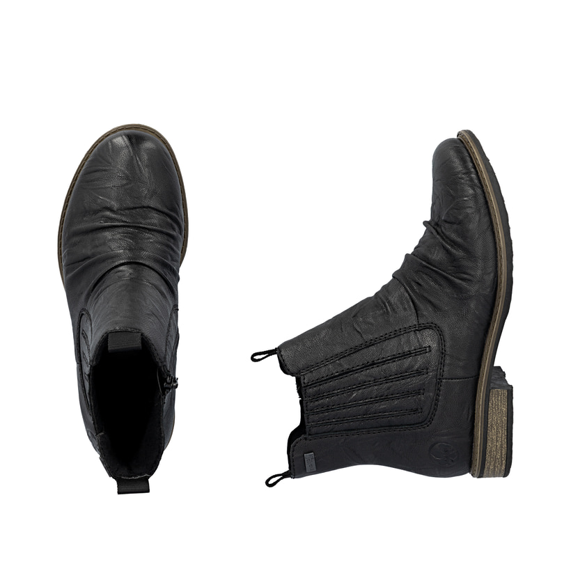 Schwarze Rieker Damen Chelsea Boots 74855-00 aus Glattleder. Schuh von oben, liegend.