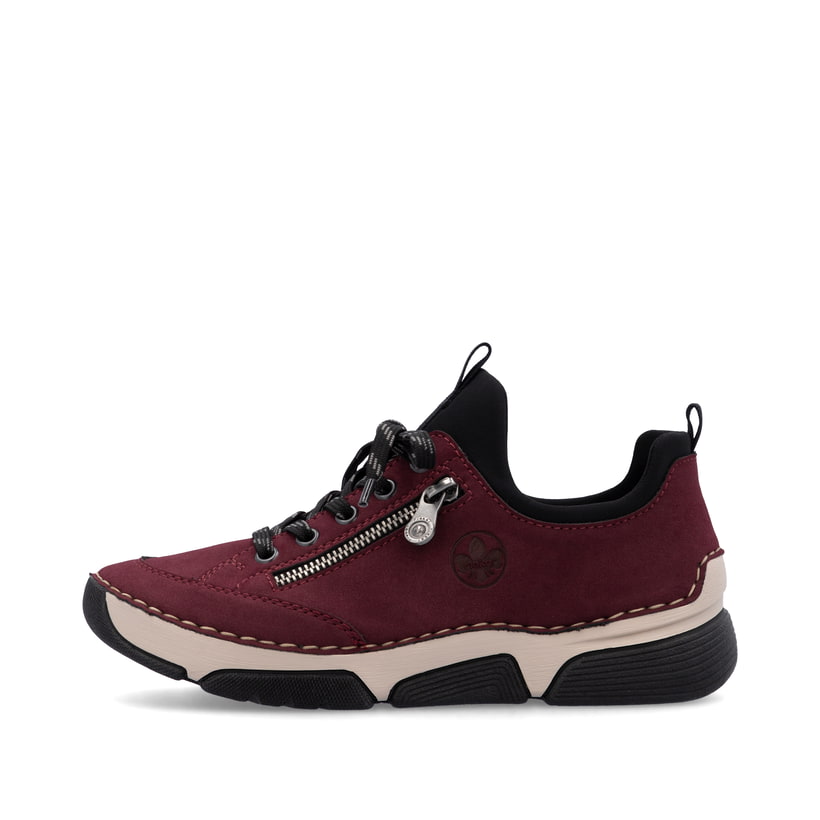 Mocassins Rieker rouges pour femme 45973-36 avec bande élastique. Côté extérieur de la chaussure.