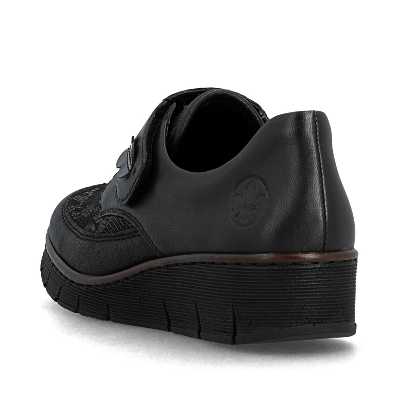 Mocassins Rieker noirs pour femme 537C0-00 avec perles noires. Chaussure vue de l'arrière.