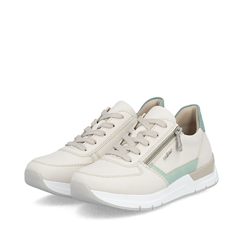 Baskets basses Rieker beiges pour femme 58902-60 avec fermeture éclair. Chaussures inclinées sur le côté.