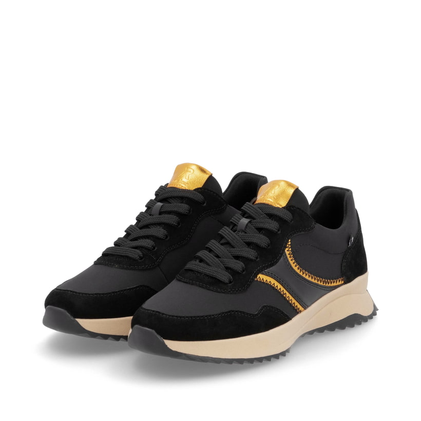 Baskets basses Rieker noires pour femme W1302-00 avec semelle durable. Chaussures inclinées sur le côté.