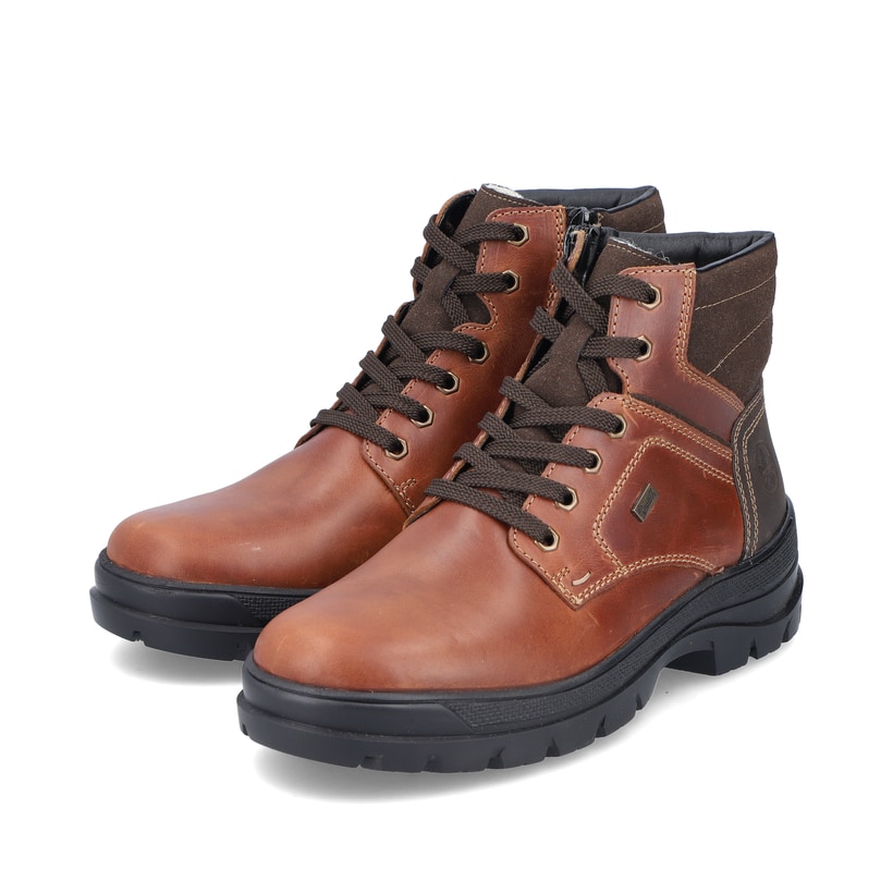 Bottes à lacets Rieker marron pour homme F5423-24 avec semelle Flip-Grip. Chaussures inclinées sur le côté.