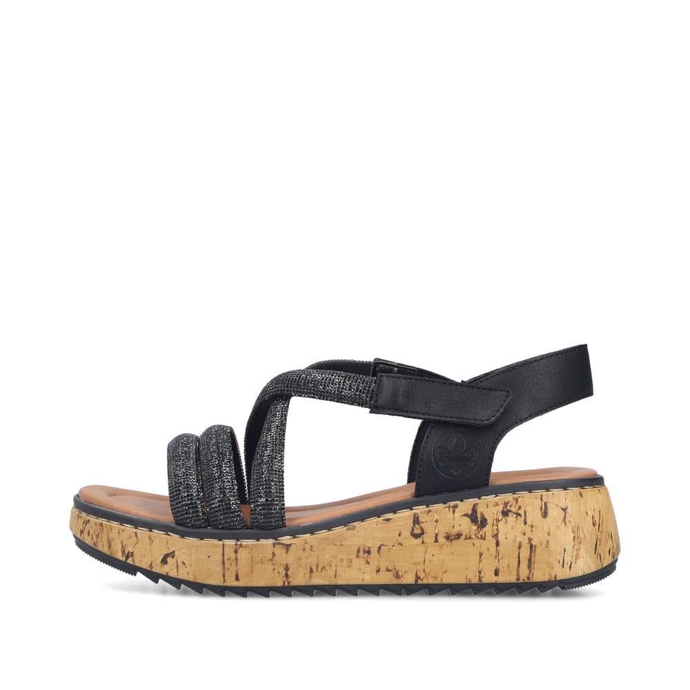 Schwarze Rieker Keilsandaletten V1762-00 mit Strasssteinen sowie Klettverschluss. Schuh Außenseite.
