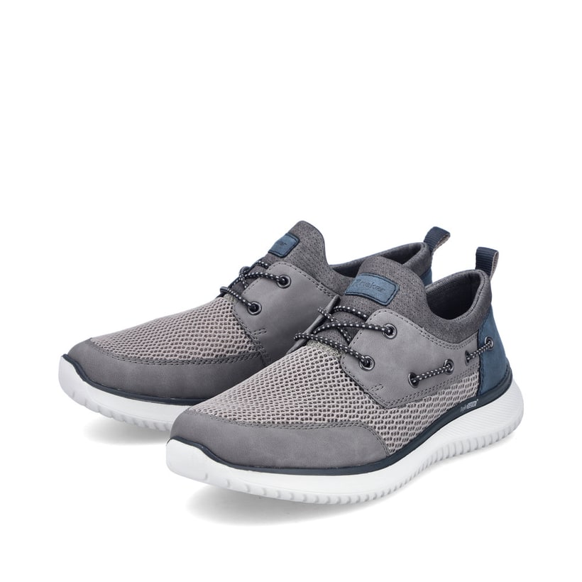 Mocassins Rieker gris pour homme B9643-42 avec bande élastique. Chaussures inclinées sur le côté.