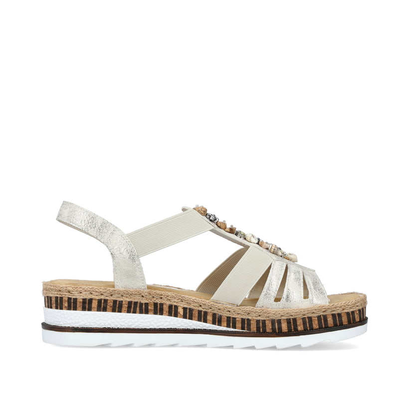 Goldene Rieker Keilsandaletten V7949-90 mit Schmuckelementen sowie Gummizug. Schuh Innenseite.