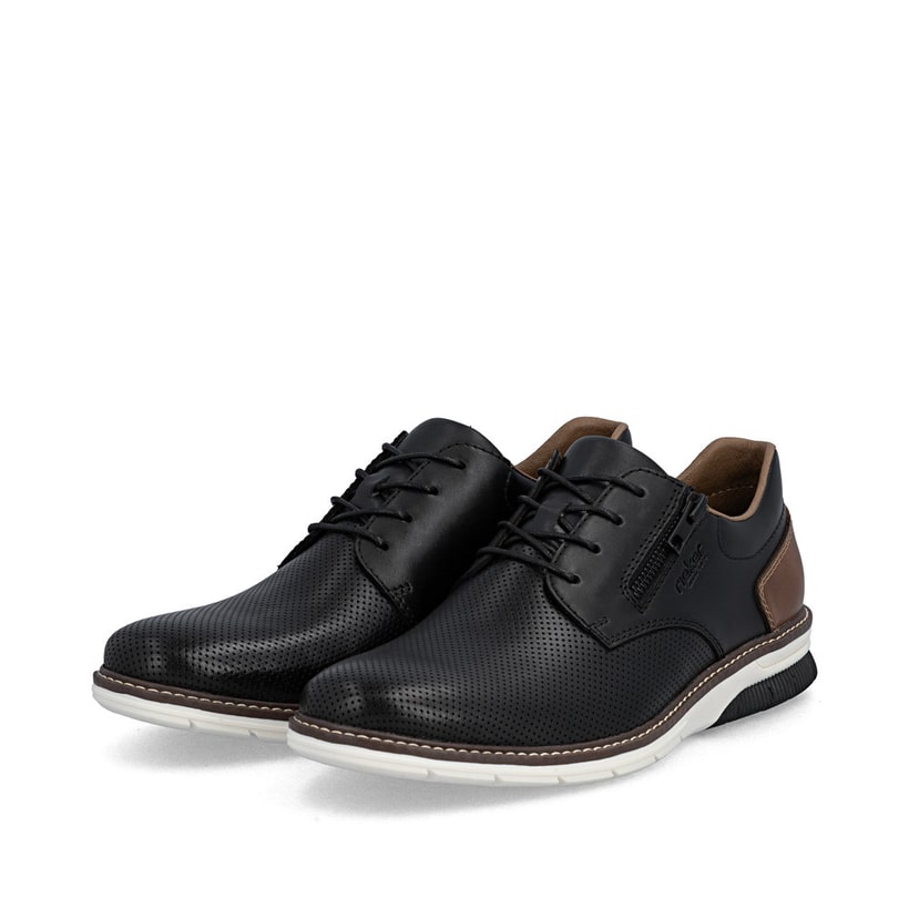 Schwarze Rieker Herren Schnürschuhe 14412-00 aus Glattleder mit Reißverschluss. Schuhpaar seitlich schräg.