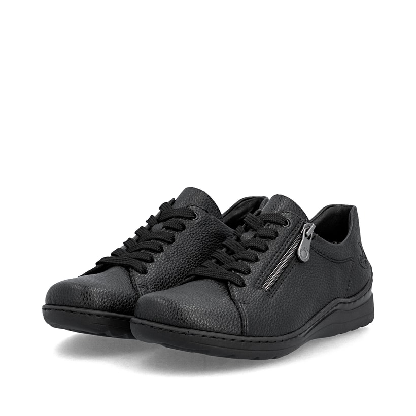 Chaussures à lacets Rieker noires femmes 48901-00 avec fermeture éclair. Chaussures inclinées sur le côté.