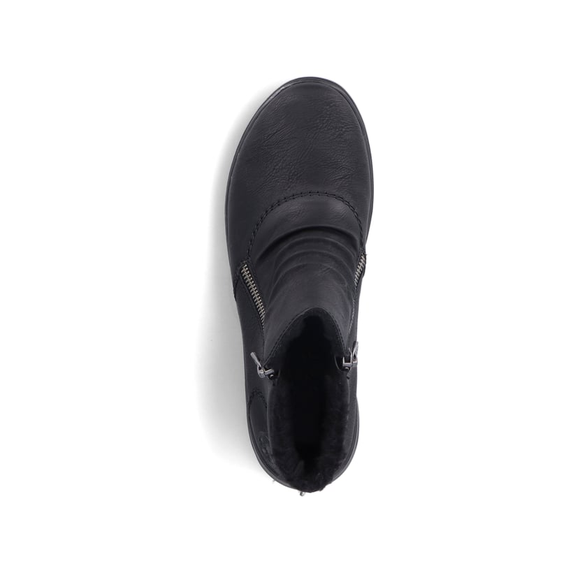 Tiefschwarze Rieker Damen Slipper Z0051-01 mit einer robusten Profilsohle. Schuh Laufsohle