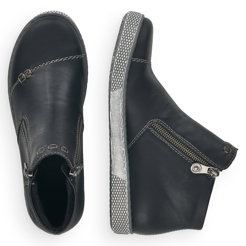 Schwarze Rieker Damen Kurzstiefel L1260-00 mit einem Reißverschluss. Schuh von oben, liegend.