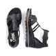 Schwarze Rieker Keilsandaletten 67480-01 mit trendigen Schnalle. Schuh von oben, liegend.