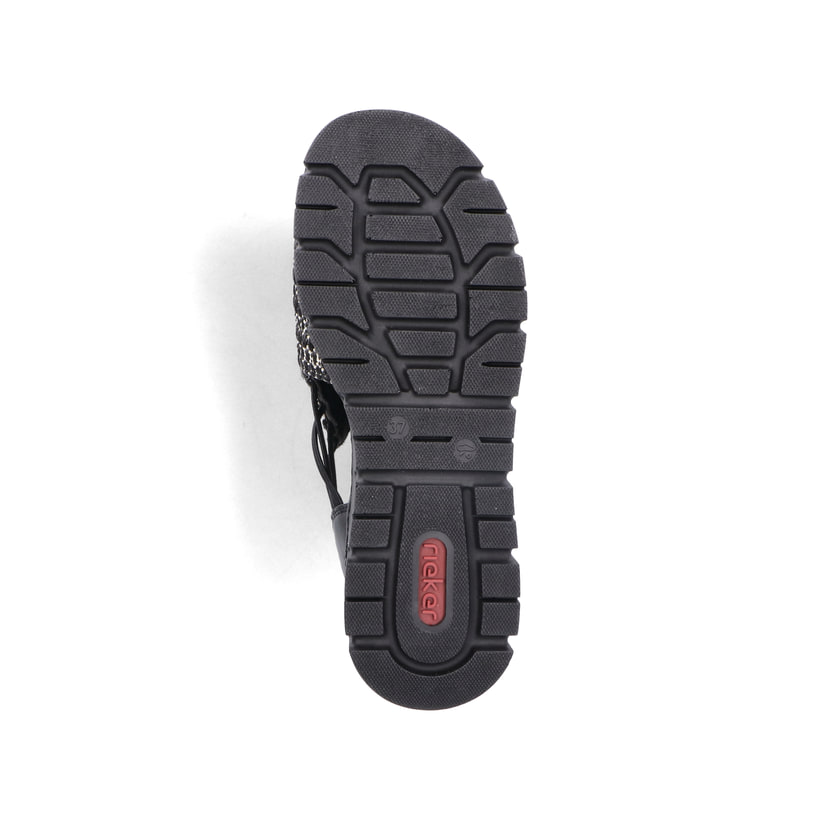 Sandales compensées Rieker noires femme V1051-00 avec bande élastique. Semelle extérieure de la chaussure.
