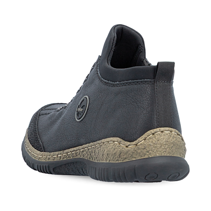 Schwarze Rieker Damen Kurzstiefel N3258-00 mit einem Reißverschluss. Schuh von hinten.