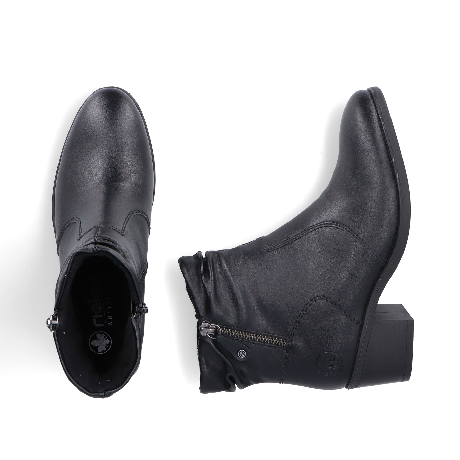 Schwarze Rieker Damen Stiefeletten 73981-00 mit einem Reißverschluss. Schuh von oben, liegend.