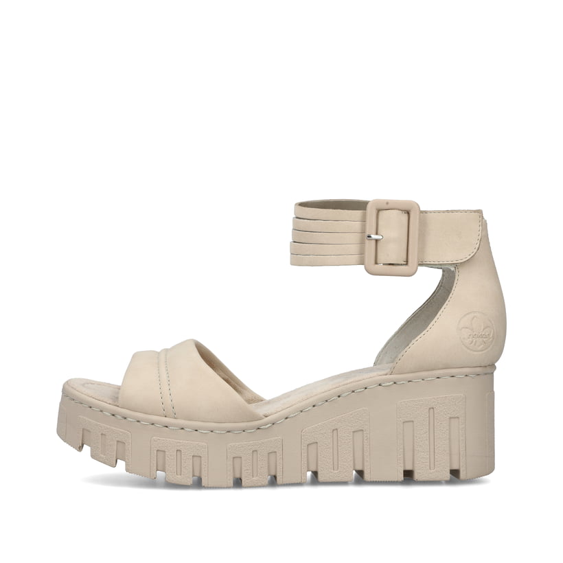 Beige vegane Rieker Keilsandaletten 68093-60 mit trendigen Schnalle. Schuh Außenseite.