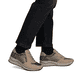 Baskets basses Rieker beiges pour femme N9503-20 avec imprimé léopard. Chaussure au pied.