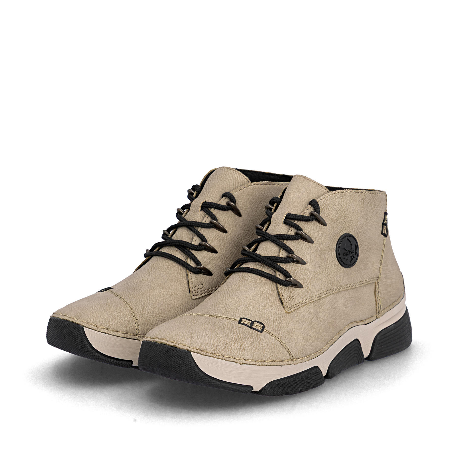 Cremebeige Rieker Damen Schnürschuhe 45902-60 mit Schnürung sowie einer leichten Sohle. Schuhpaar schräg.