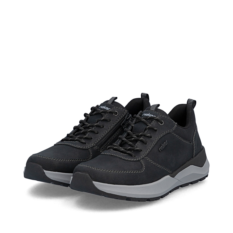Chaussures à lacets Rieker noires hommes 06002-00 avec fermeture éclair. Chaussures inclinées sur le côté.