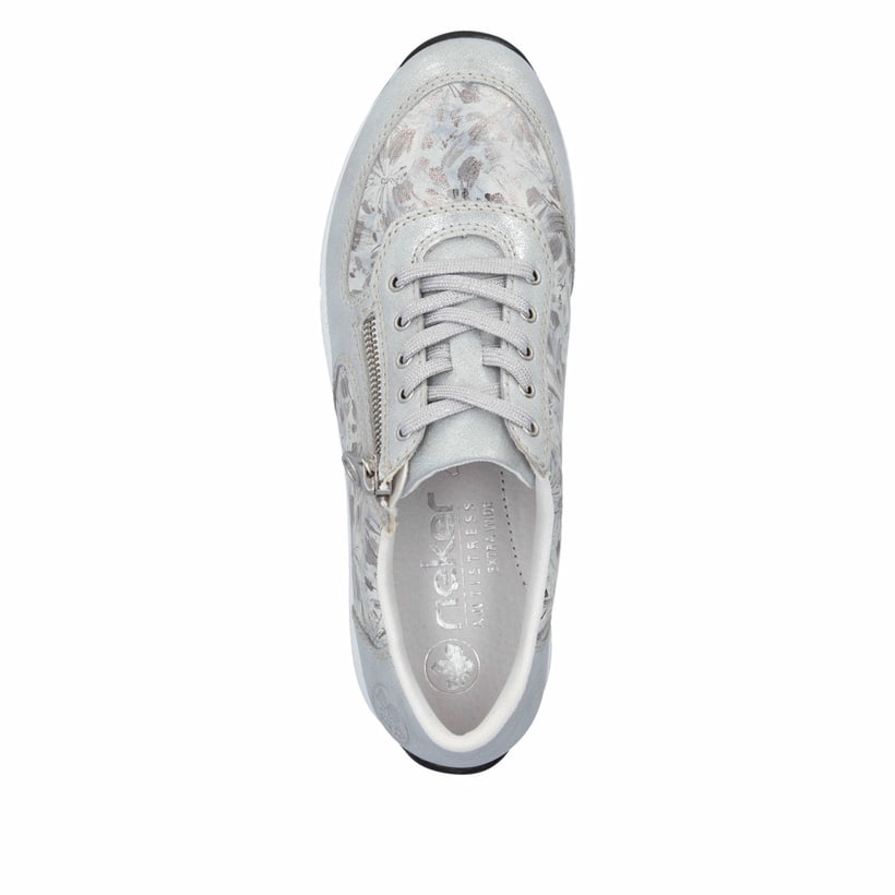 Baskets basses Rieker blanches pour femme N1112-80 avec motif floral. Chaussure vue de dessus.
