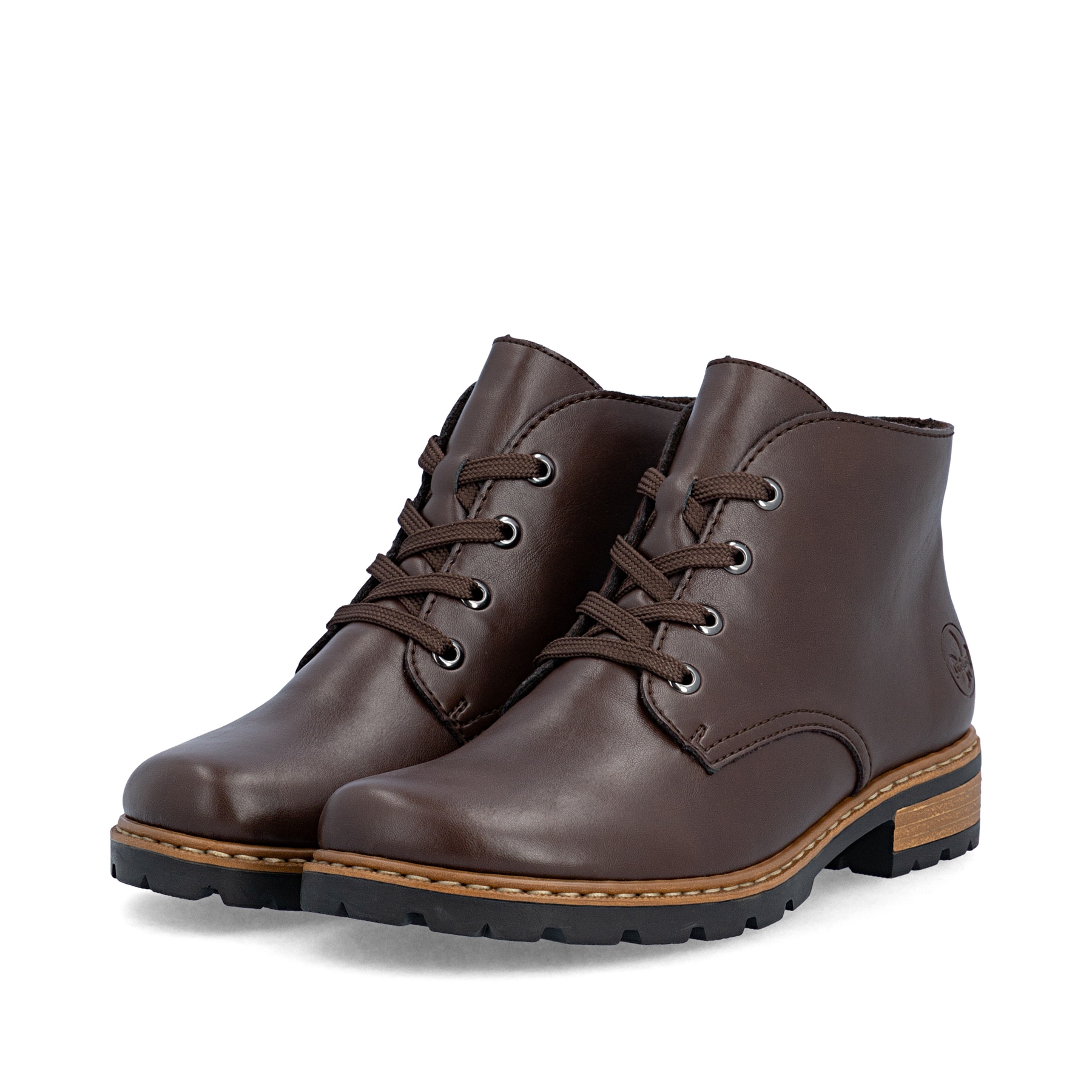Bottes à lacets Rieker marron pour femmes Z9310-25 avec lacets. Chaussures inclinées sur le côté.