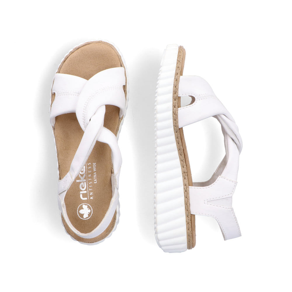 Weiße Rieker Keilsandaletten 63261-80 mit einem Gummizug sowie der Extraweite H. Schuh von oben, liegend.
