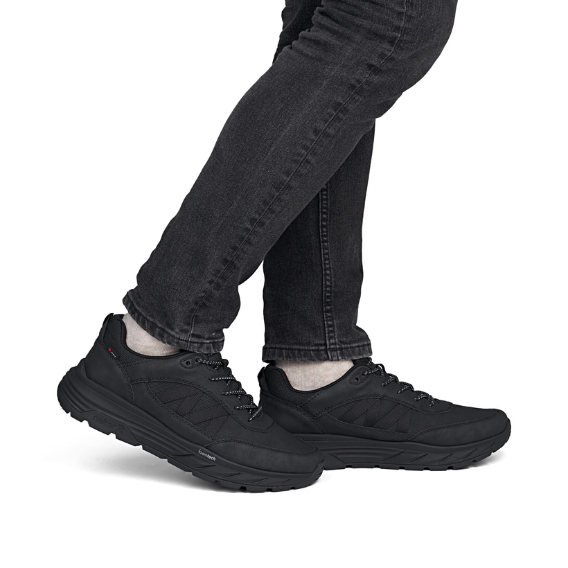 Mocassins Rieker noirs hommes 06155-00 avec membrane RiekerTEX hydrofuge. Chaussure au pied.